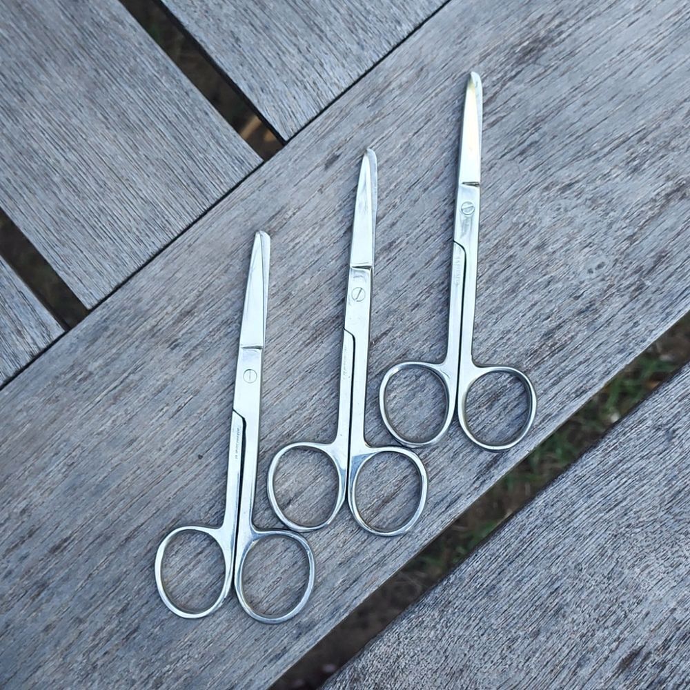 Three pairs 4 1/2" scissors EUC